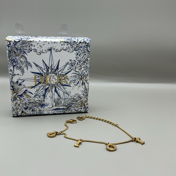 Authentic DIOR Gold tone charm bracelet with box - Picture 3 of 3